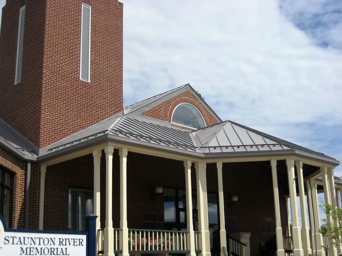 Skilled roofing craftsmen working on a residential roof in Beaufort